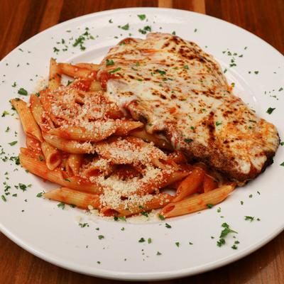 Chicken Parmesan, with penne pasta.