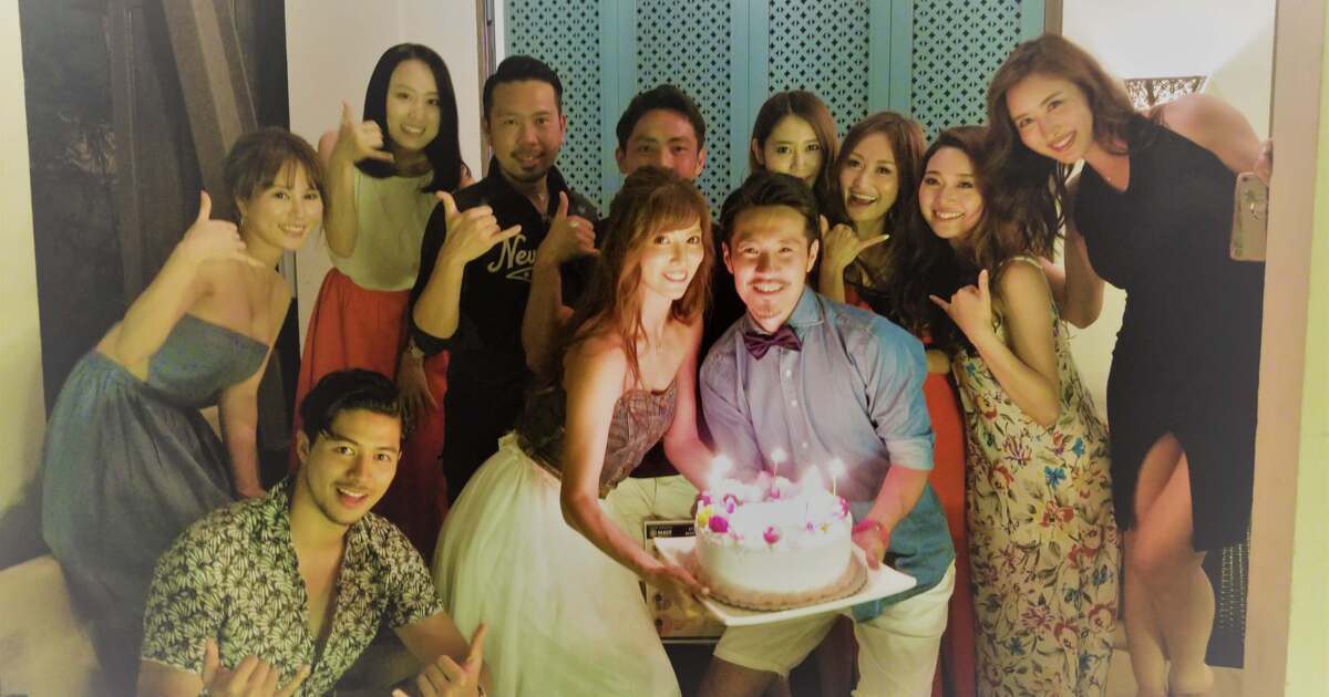 Group picture with a birthday cake