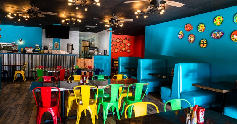 Interior, tables and chairs ready for guests