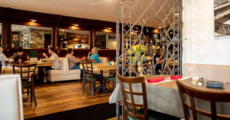 Interior, guests enjoying themselves in the back