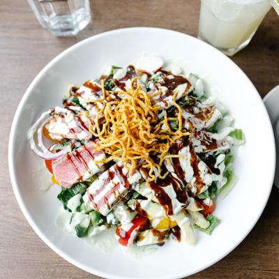 Ahi Tuna Salad dressed with wasabi aioli and soy syrup.