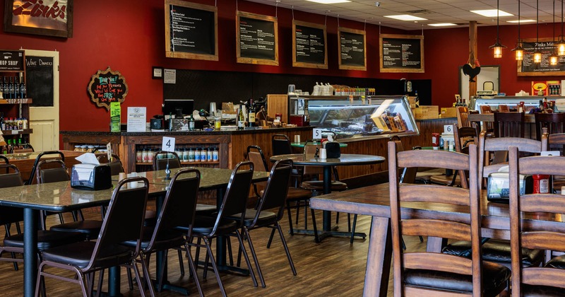 Interior seating area with chairs and tables