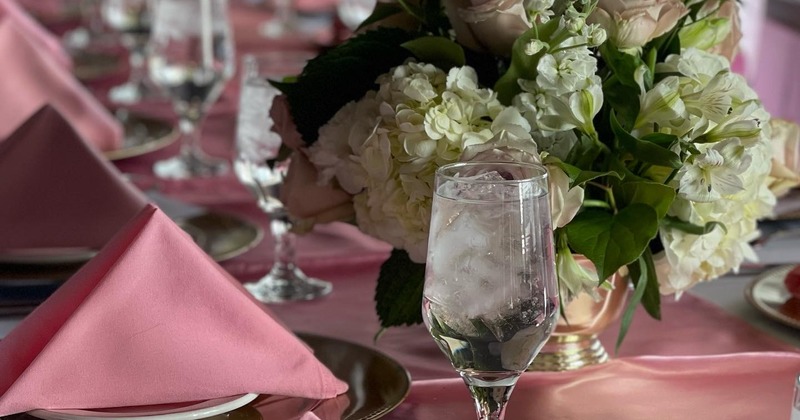 Interior,  set table with tableware and flowers, closeup