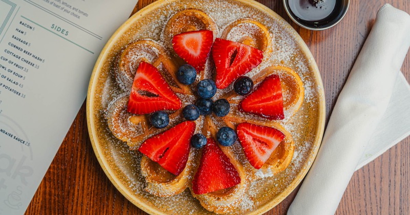 Waffle with fresh berries and powdered sugar
