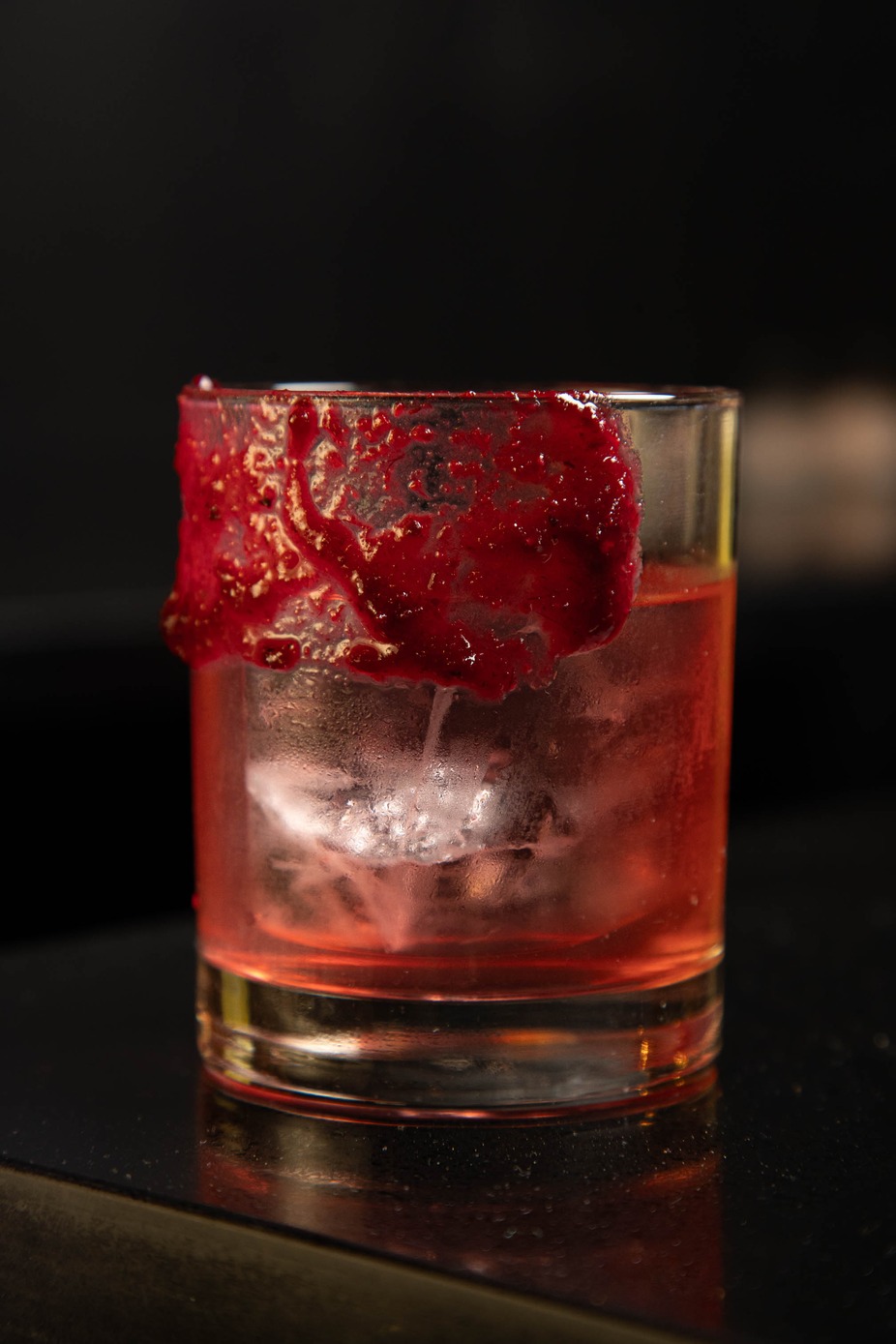 Red cocktail with chamoy