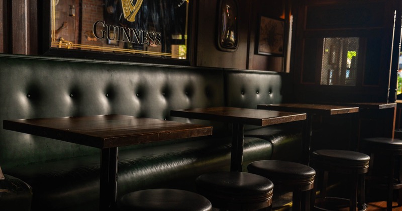 Seating area, wall seating and tables with seats