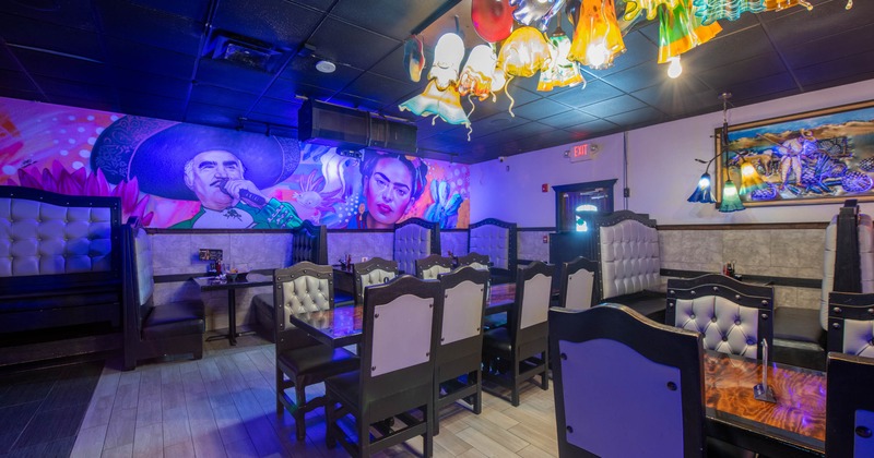 Interior, dining area, sating booths, tables for four and eight, neon lighting