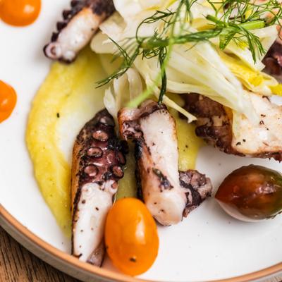 Grilled octopus with veggies.