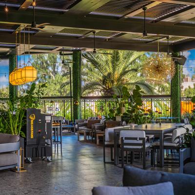 Covered patio, seating area.