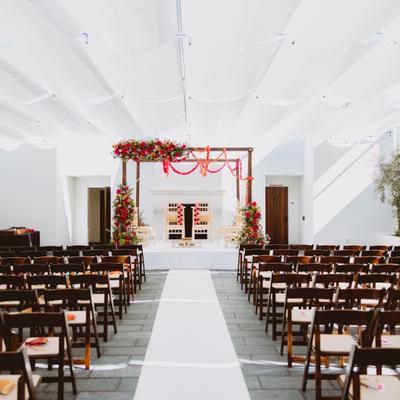 The isle surrounded by rows of chairs.