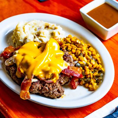 Hamburger steak,  poblano corn and mashed potatoes on the side.