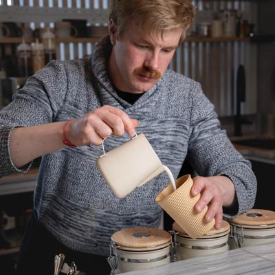 Barista preparing coffee.