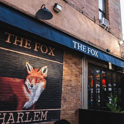 Restaurant front entrance and mural.