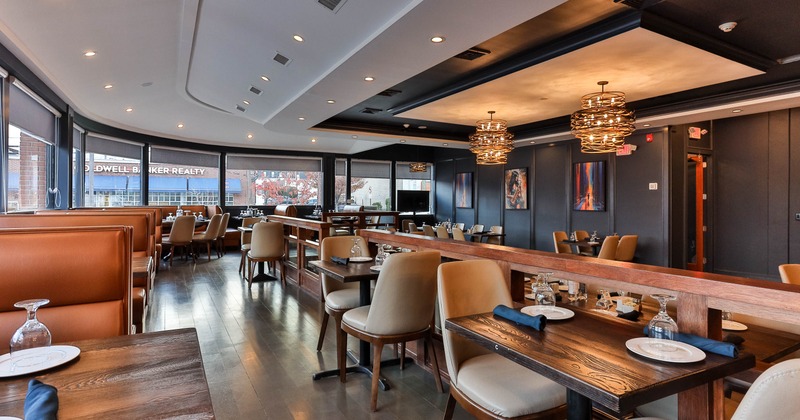 Interior, dining area with tables set for guests