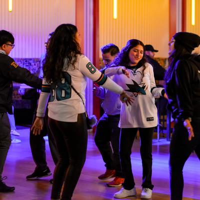 Sharks fans dancing.