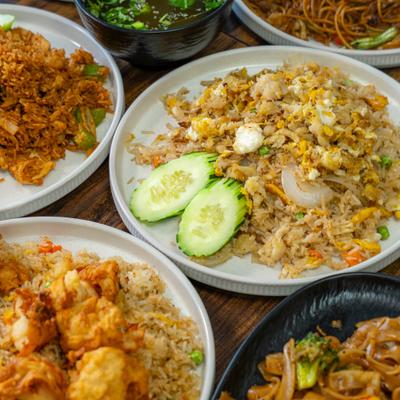 Assorted Thai dishes served on a table.