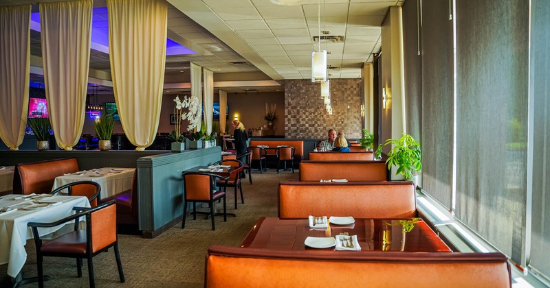 Wide view to diner area, over the booths and tables