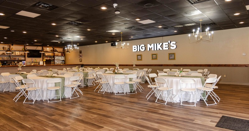 Interior, event hall with tables and chairs