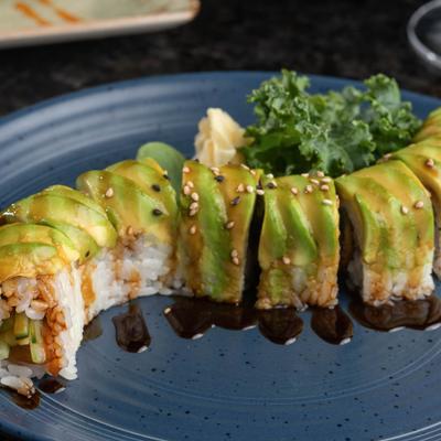 Dragon Roll topped with avocado.
