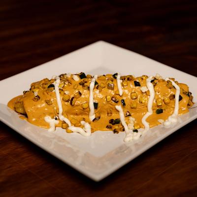 Texas Burrito, smothered in cheese sauce.