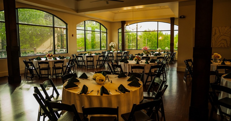 Interior, dining area with large round tables and chairs
