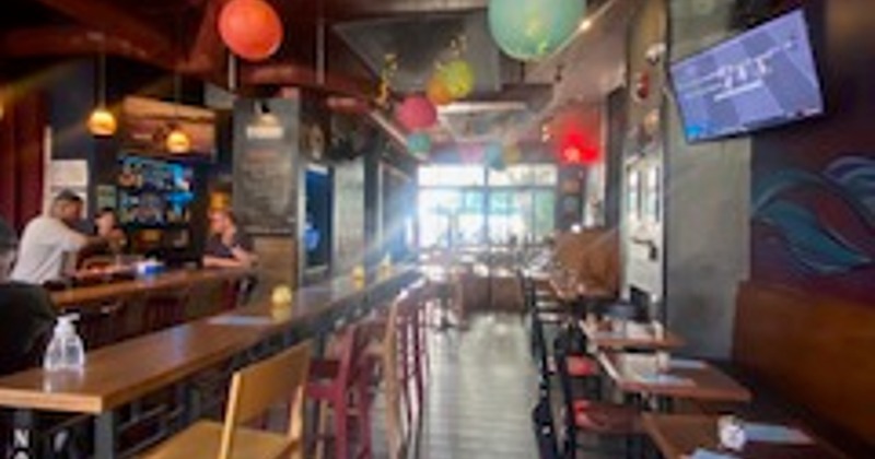 Interior, tables and chairs ready for guests