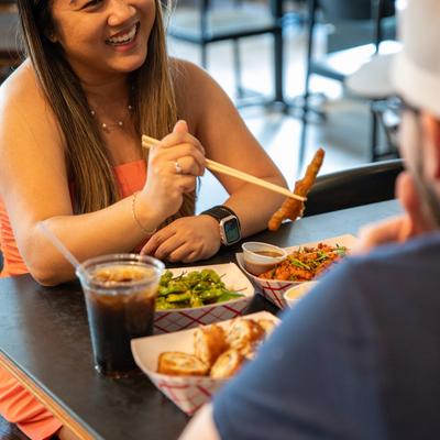 People talking and eating.