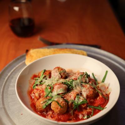 Meatballs in marinara sauce.