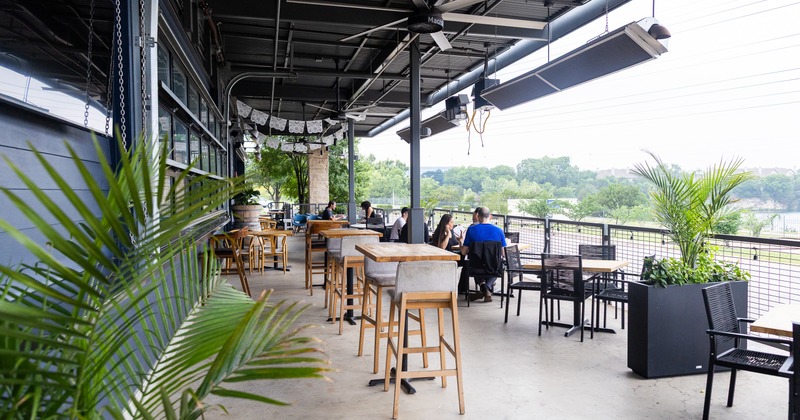 Exterior, terrace, tables,chairs, guests, plants