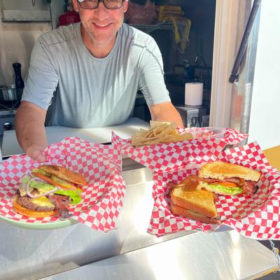 Employee serving food.