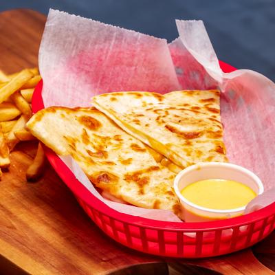 Cheese quesadilla with fries and cheese dip.