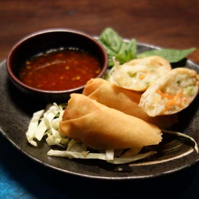 Vegetable spring roll served with Thai sweet chili sauce.