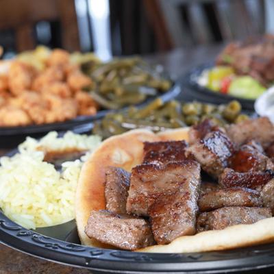 Gyro, with rice and gravy, and green beans.