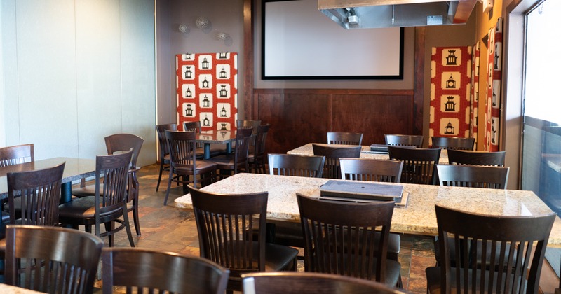 Interior, lined dining tables and seats