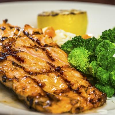 Grilled salmon with broccoli and rice.