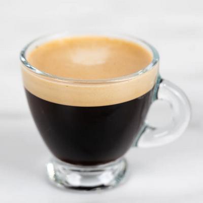 Double espresso shot in a cup.