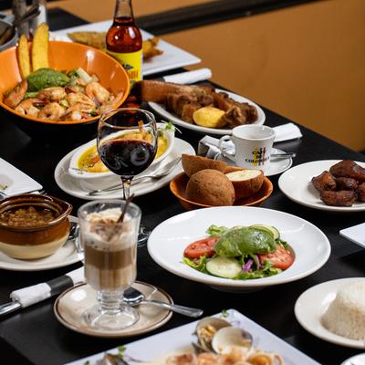 Assortment of food and drinks on the table.