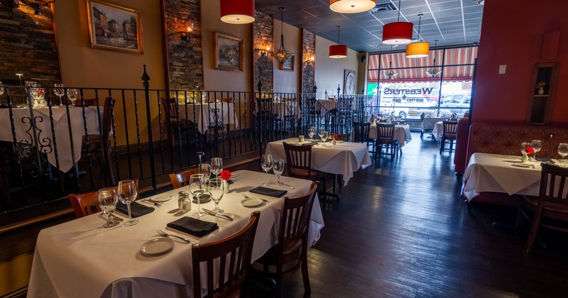 Interior, dining area, set up tables for four and two, dining area on elevated platform