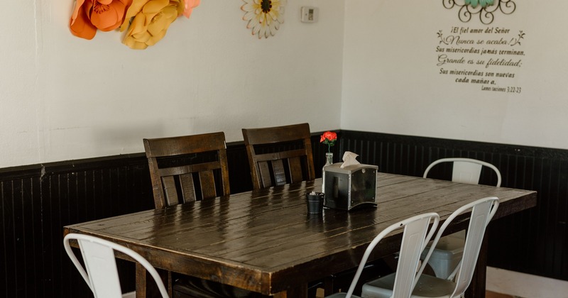 Rustic wooden table with chairs