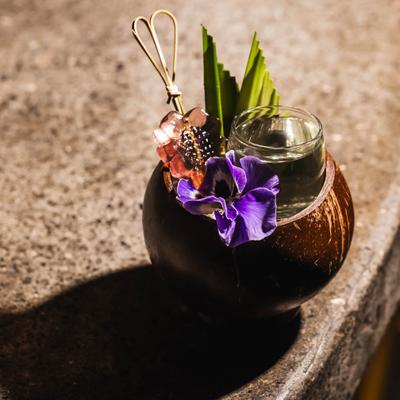 Nahm Hom cocktail, served, front view.