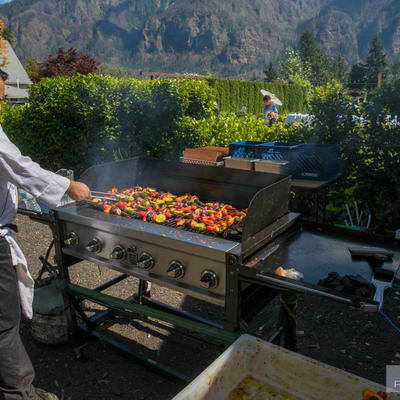 Employee working on barbecue