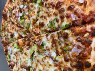 picture is our new chorizo pizza with green peppers and red onions