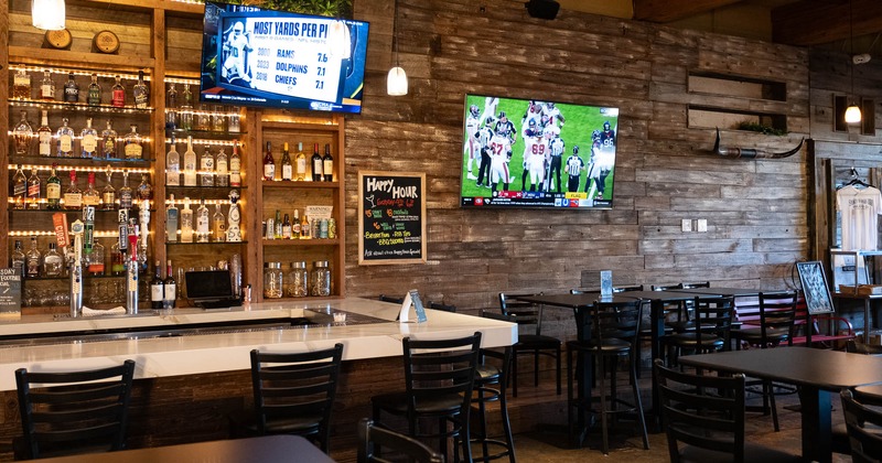 Interior, seating place with TVs on the wall
