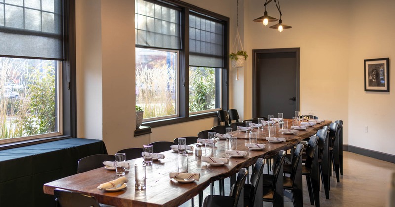 Interior, seating area with a long table
