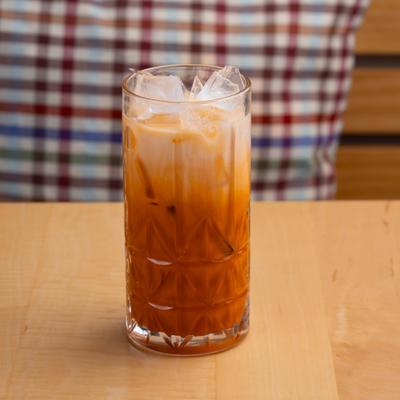Thai tea served in a highball over ice.