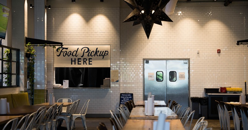 Interior, lined up tables and chairs