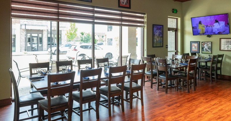 Interior seating area with chairs and tables