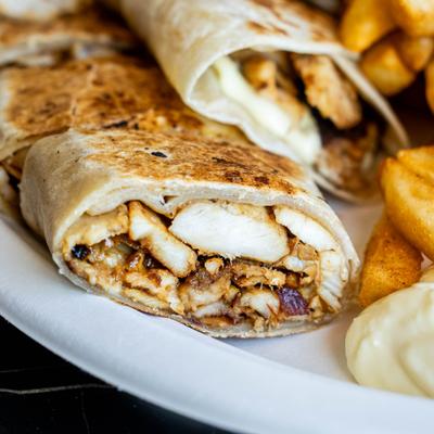 Grilled chicken wrap and fries.