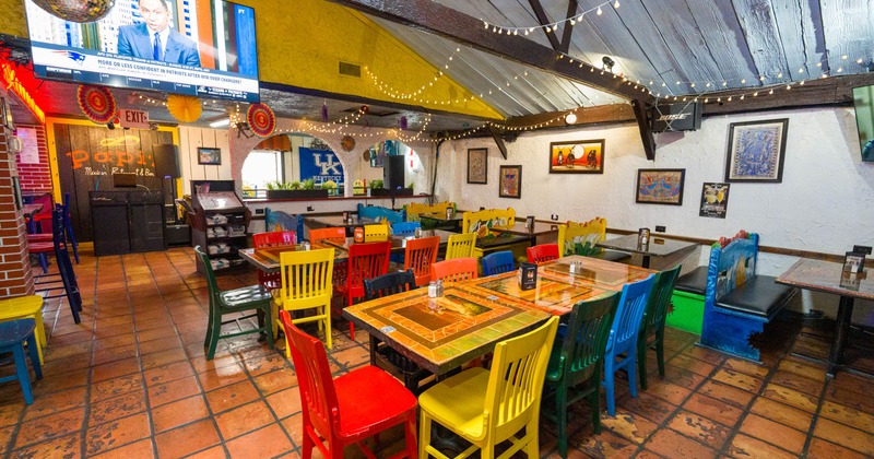 Interior, colorful tables and chairs