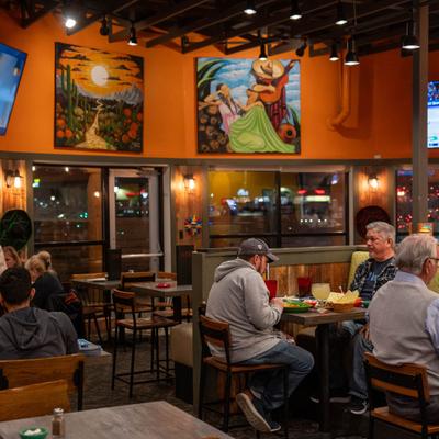 Interior, dining area with guests.